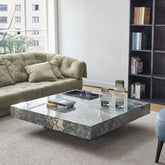 Square coffee table with luxury marbled top and sturdy metal legs